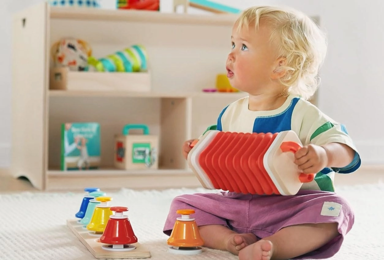 Lovevery | The Music Set | 6 Musical Instruments and Rhythm & Songs Book, Preschool Education and Montessori Early Learning Musical Toy, Ages 18 Months to 4  Years